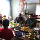 Marcus Samuesson dines with a family of recent Syrian refugees in Detroit.